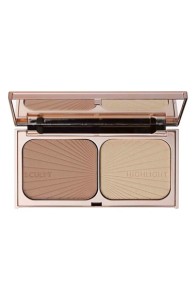 I have become obsessed with this brand, Charlotte Tilbury. Her makeup is beautiful and usable. This bronzing/highlighter duo is perfect.
