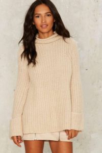 A cozy sweater is a staple every fall/winter season. Stick with a basic color and cut and you don't have to spend a ton. This one from Nasty Gal is only $58.00.